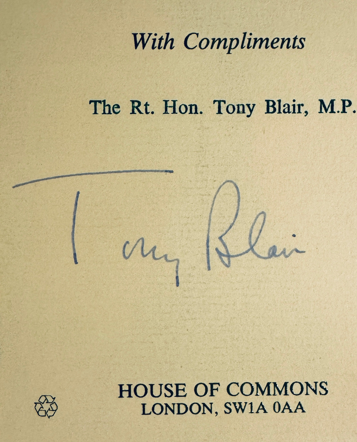Close-up view of Tony Blair signature in blue pen on official House of Commons stationery.