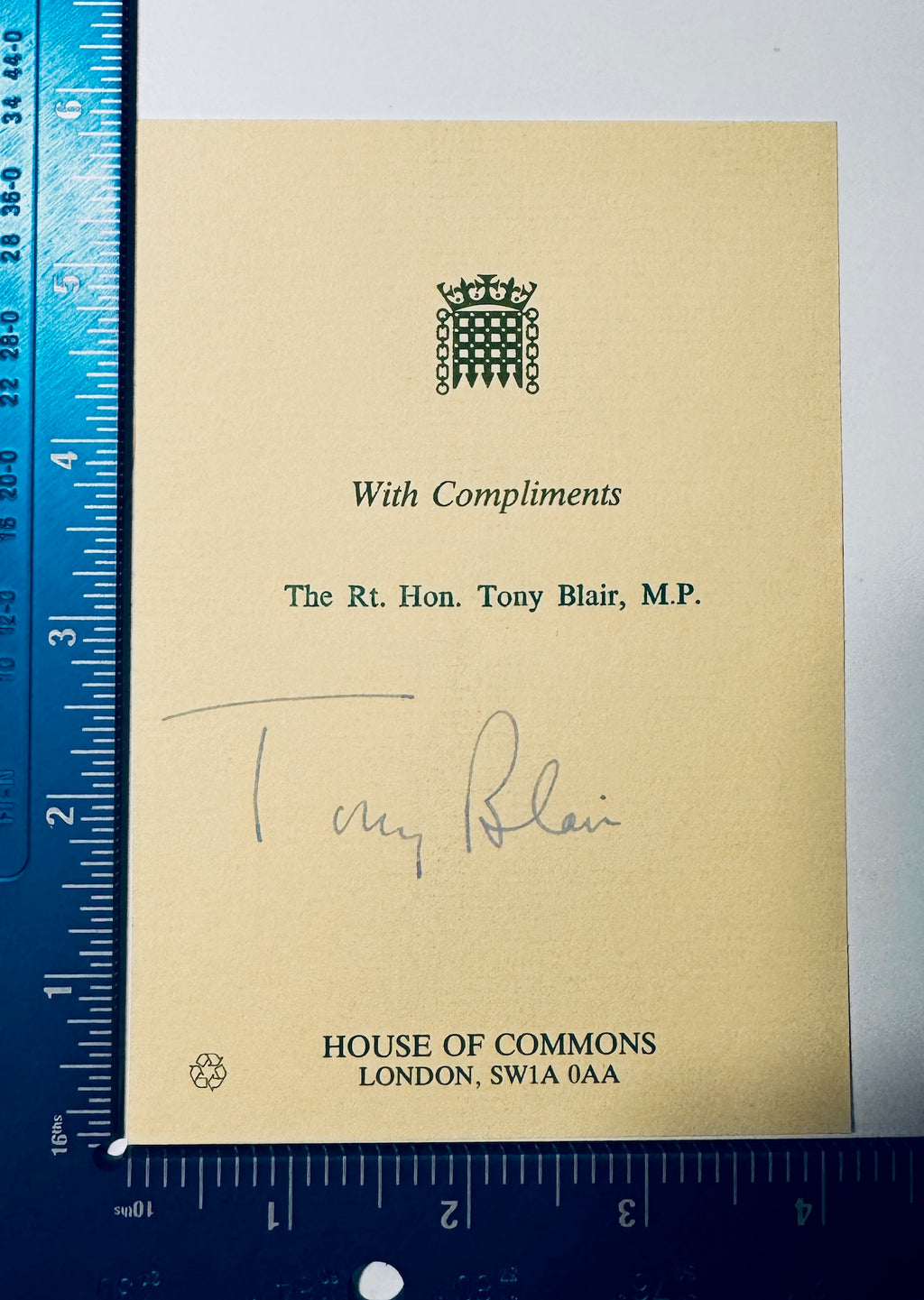 Tony Blair autographed House of Commons compliments slip next to a ruler measuring 4 by 6 inches.