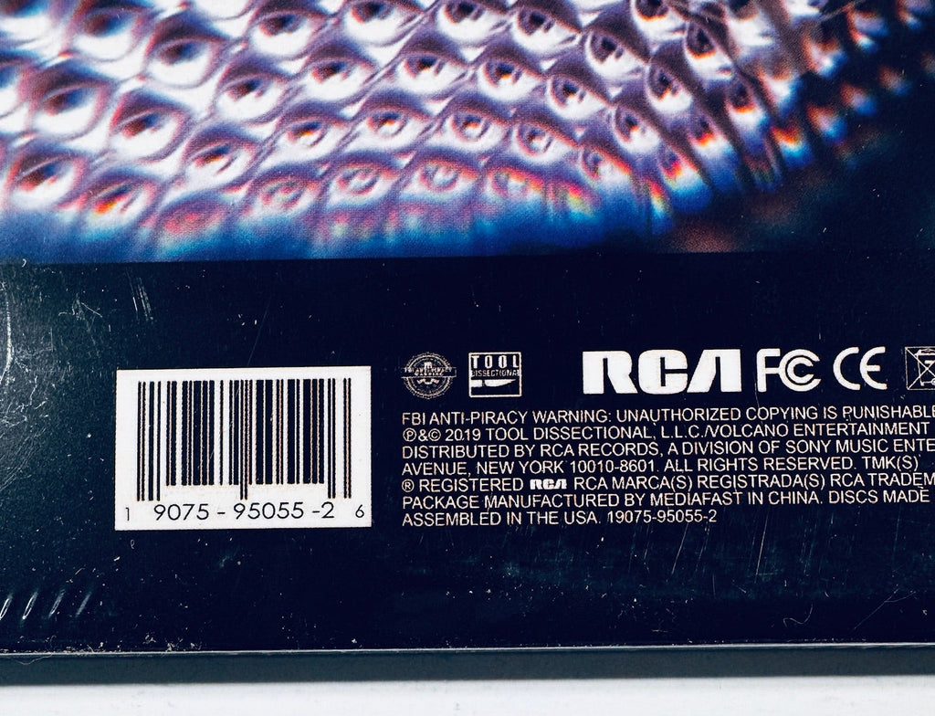 Close-up of the barcode and label info on the back cover of the unofficial gold vinyl release of Tool's Fear Inoculum.