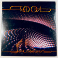 Front cover of the unofficial gold vinyl release of Tool's Fear Inoculum featuring dark psychedelic artwork and gold typography.