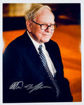 A professional 8x10 photograph featuring an authentic autograph by business mogul Warren Buffett.